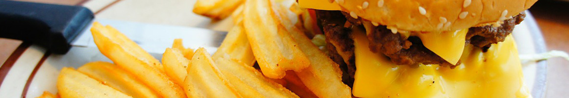 Eating Burger at Bob's Burgers & Brew restaurant in Kennewick, WA.